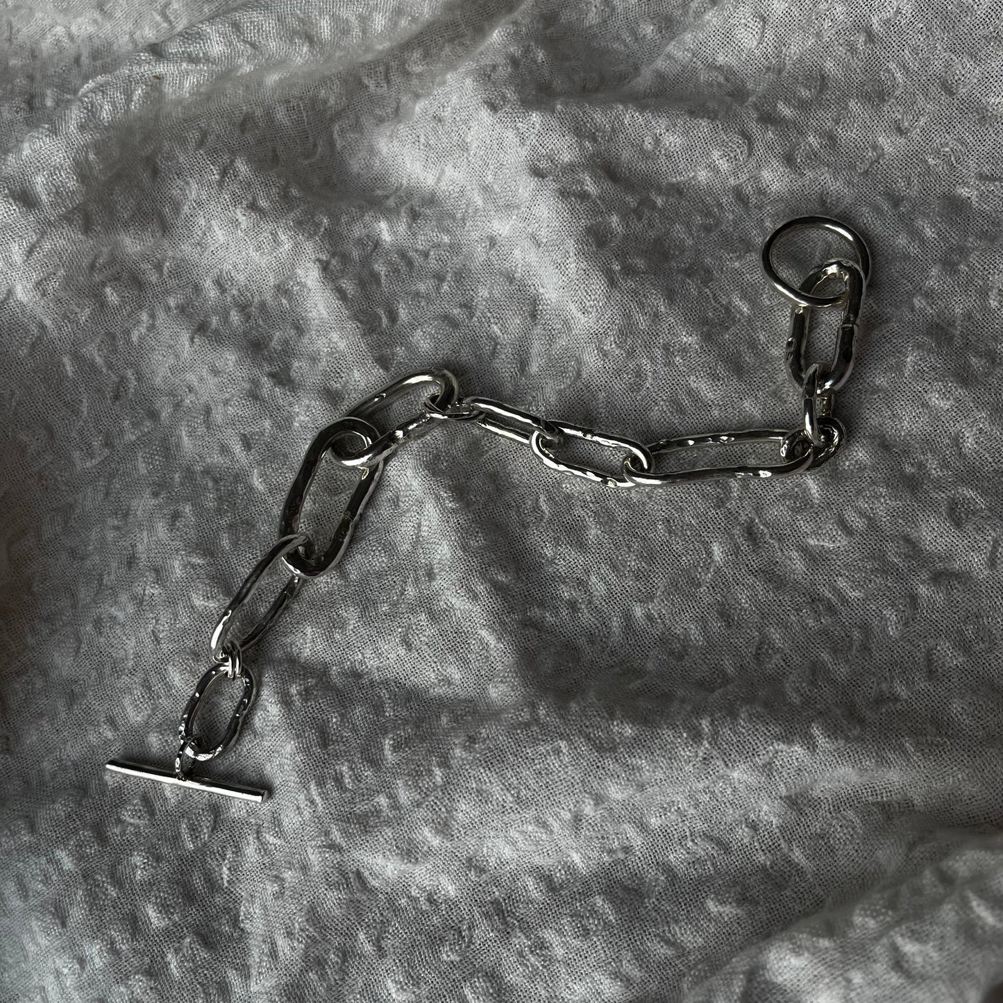 Raw style bracelet hand-forged in sterling silver