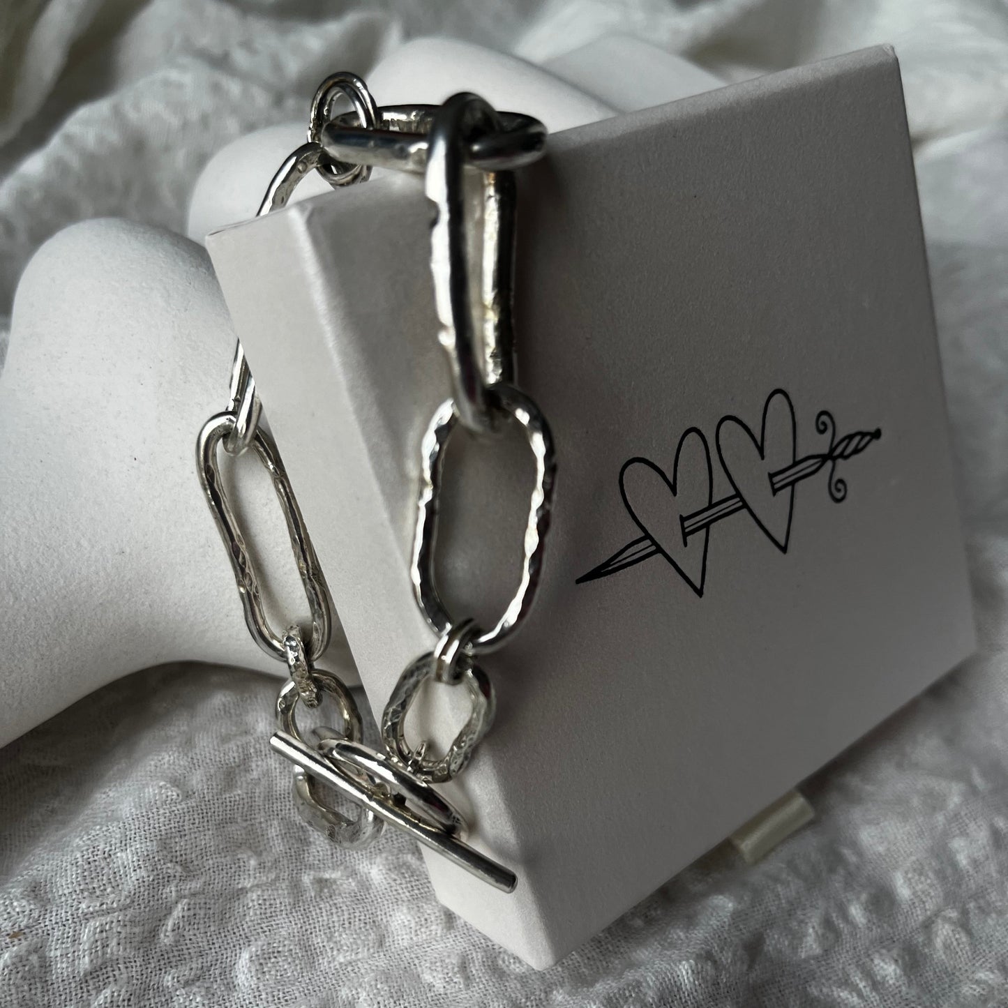 Raw style bracelet hand-forged in sterling silver