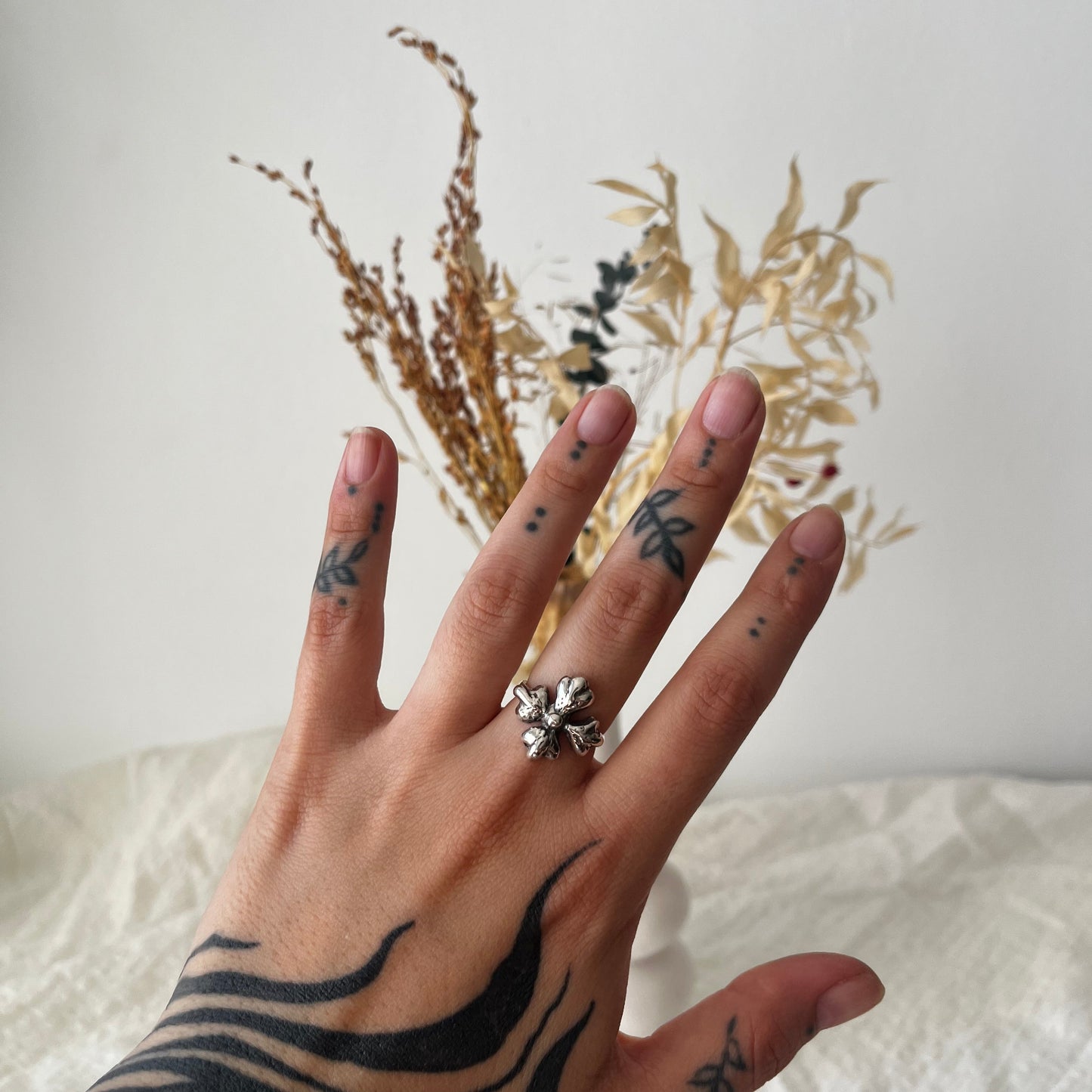 Four petal handmade sterling silver ring