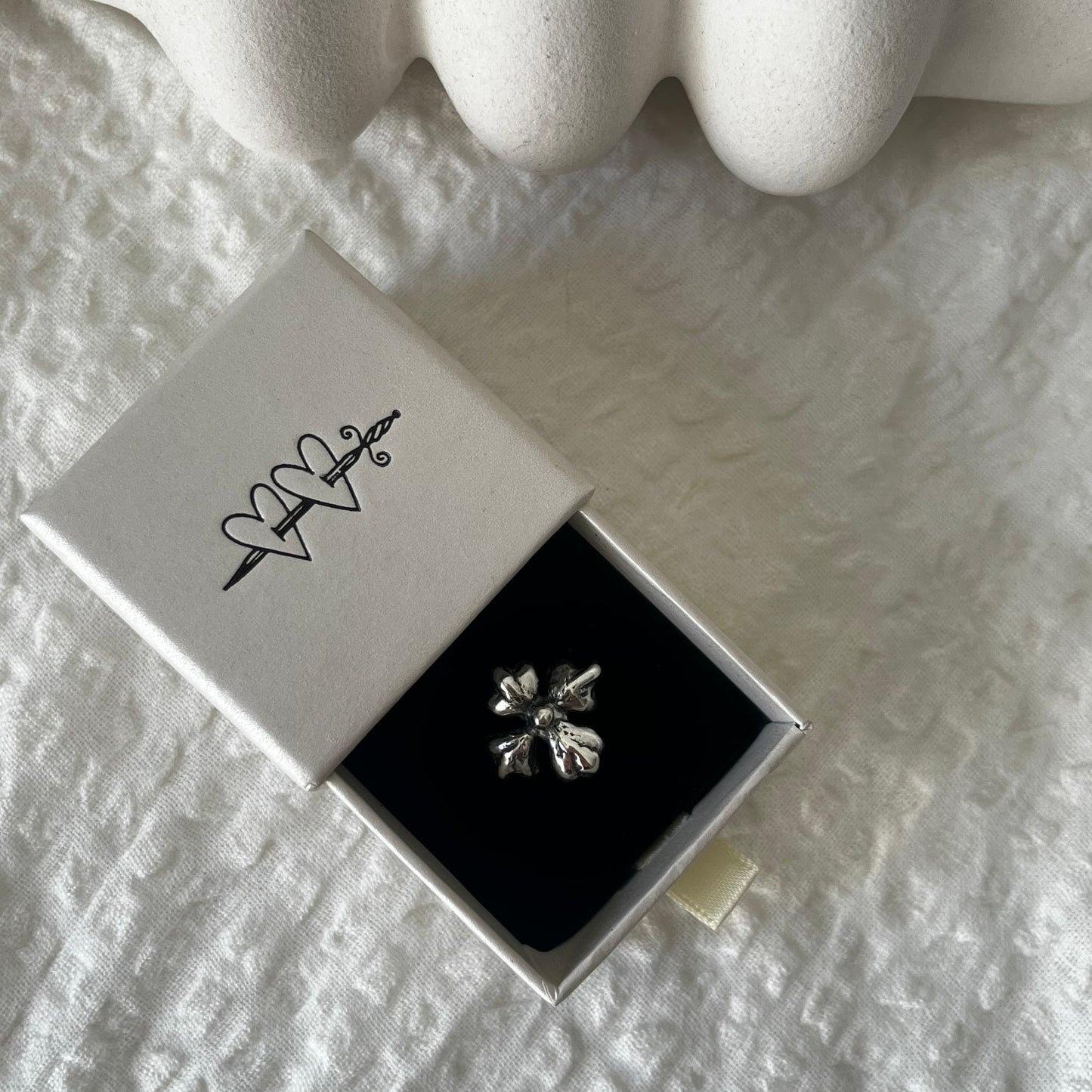 Four petal handmade sterling silver ring