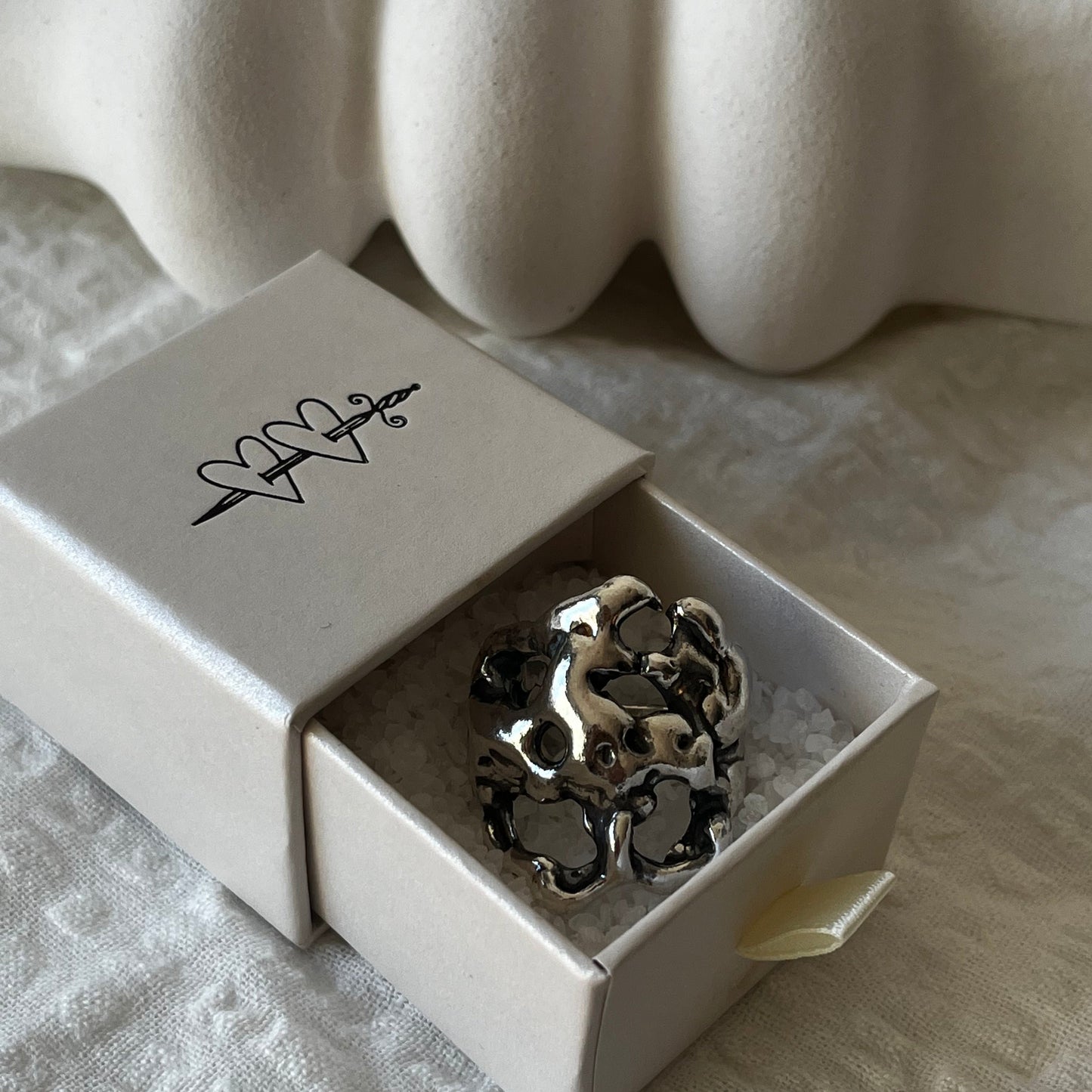 Handmade sterling silver ring using the lost wax method. Organic design.