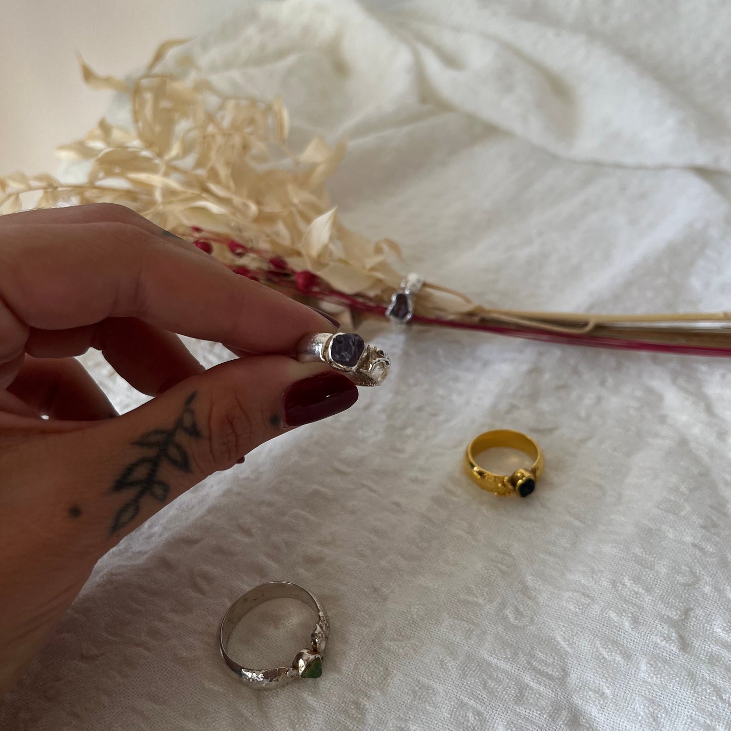 Organic handmade rings in silver and gold plated with different stones in the center