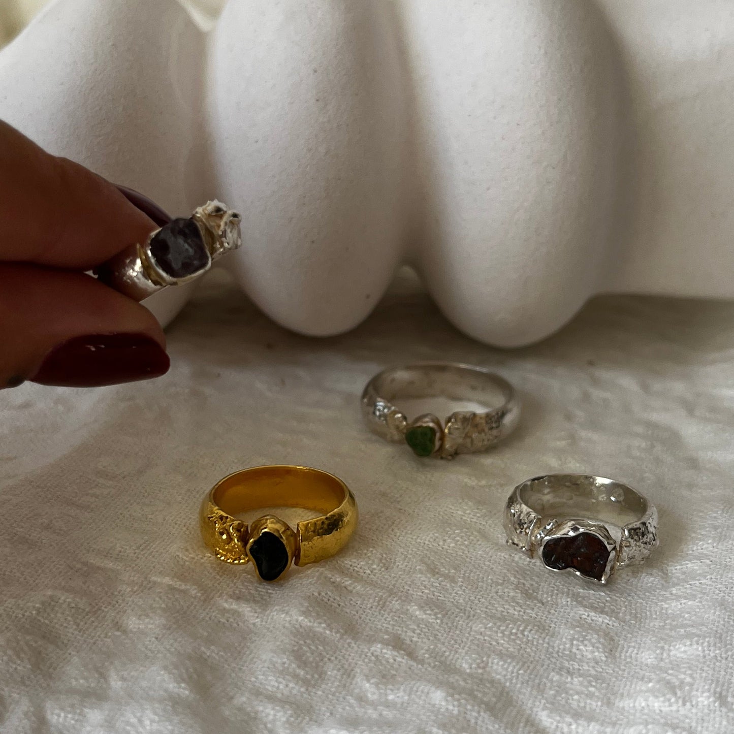 Organic handmade rings in silver and gold plated with different stones in the center