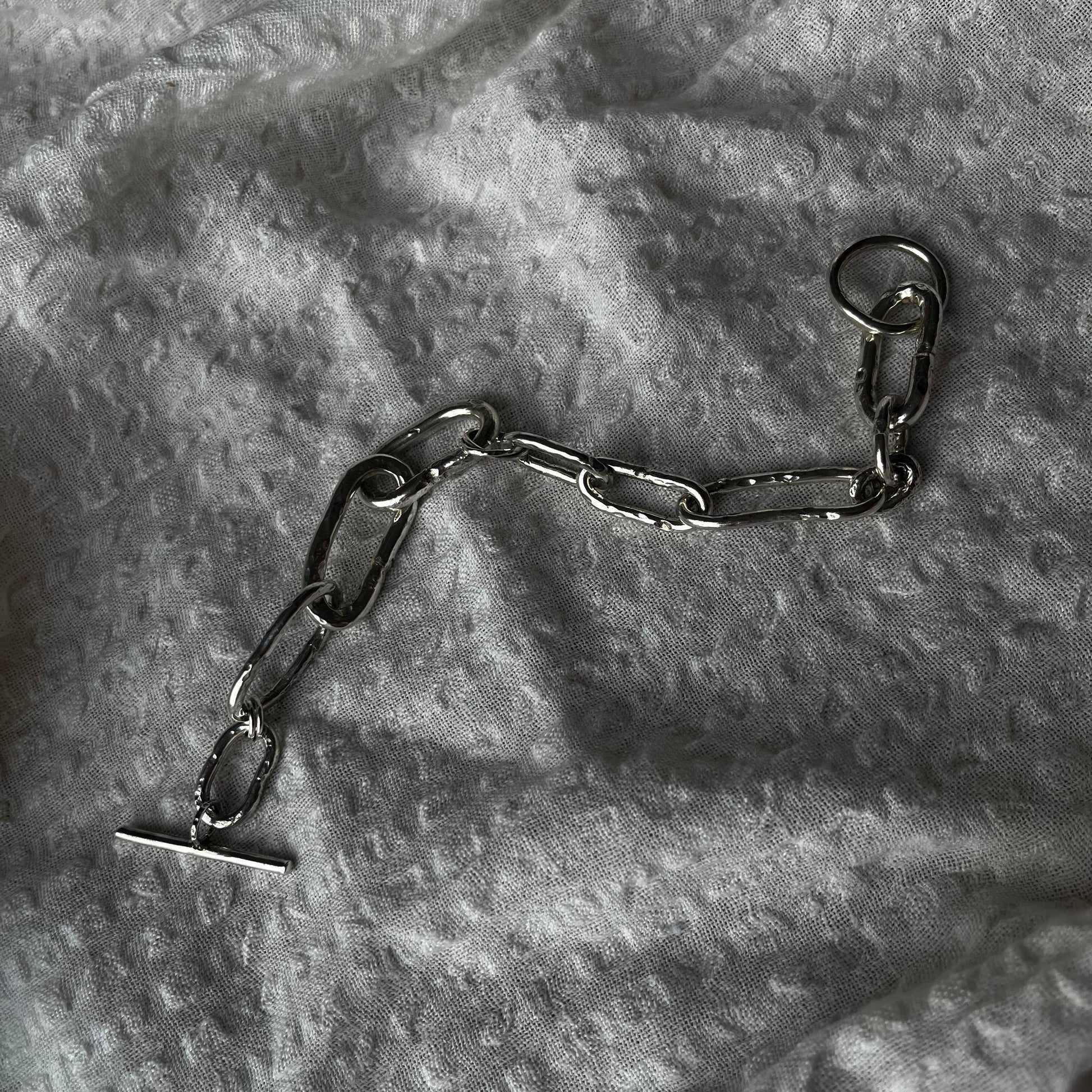 Raw style bracelet hand-forged in sterling silver