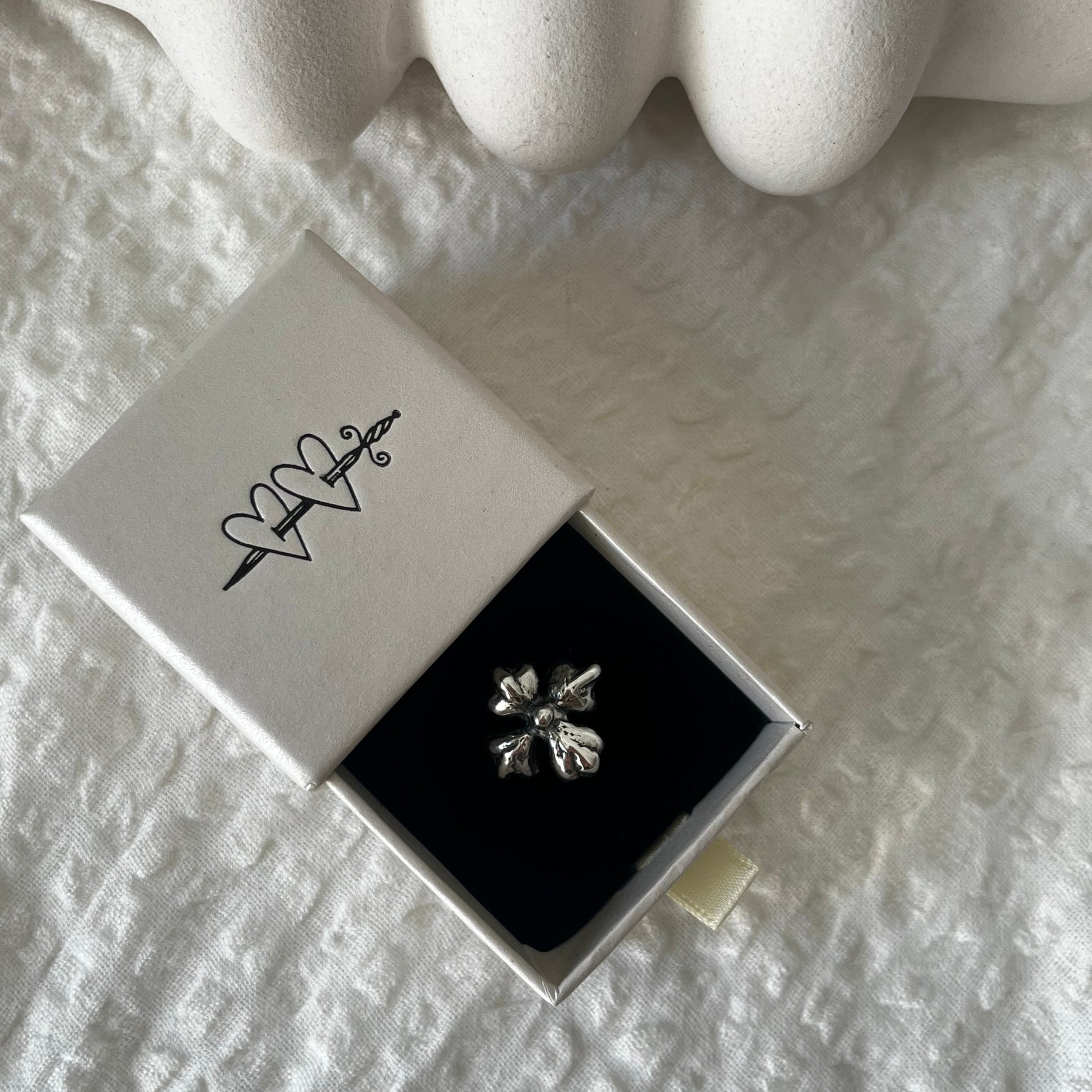 Four petal handmade sterling silver ring