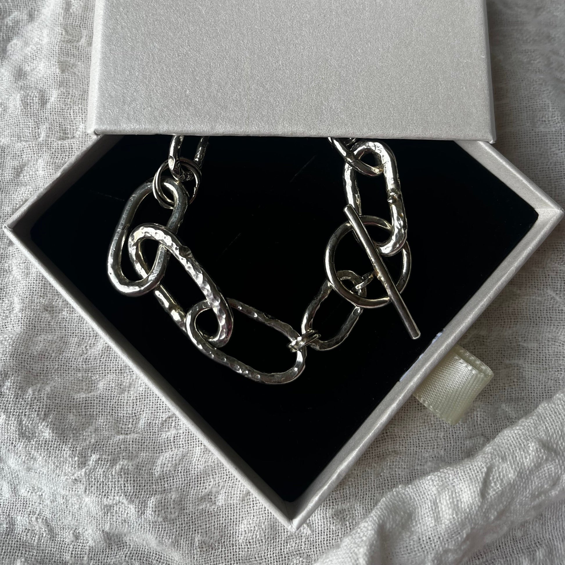Raw style bracelet hand-forged in sterling silver