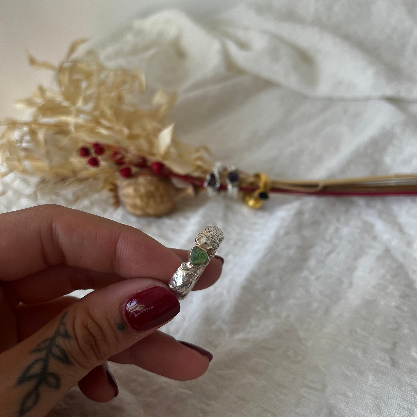 Organic handmade rings in silver with a green sea glass in the center