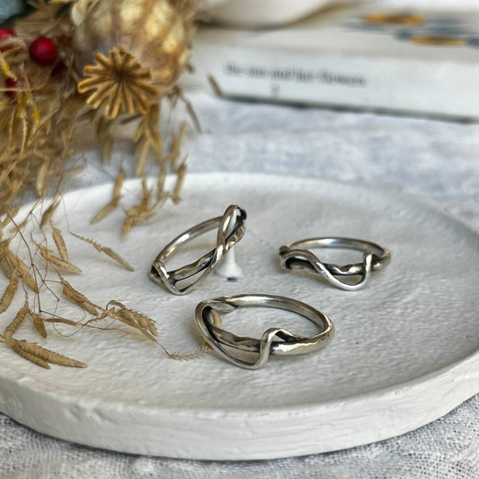 Abstract double band rings with organic form made of sterling silver 